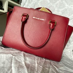 Michael Kors crossbody & hand bag.